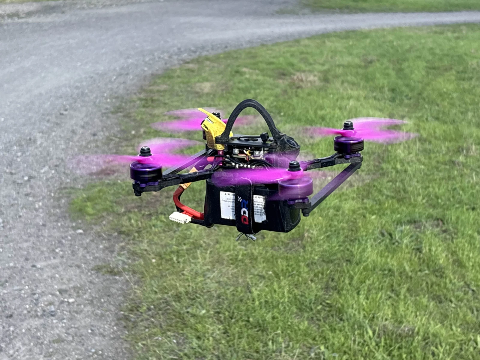 Assembled HexR5 build pictured in flight with horizontal braces.